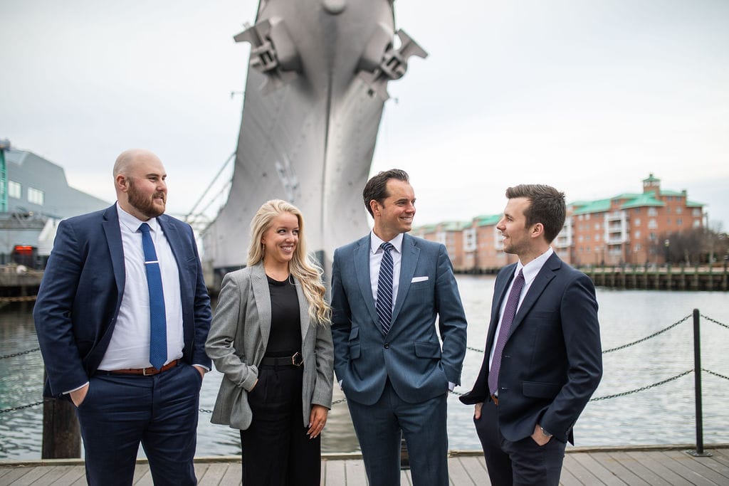 McCormick Law & Consulting attorneys John McCormick, Steven Thomas, Kari Ann Hedwall, and Alex Rich on the Norfolk waterfront