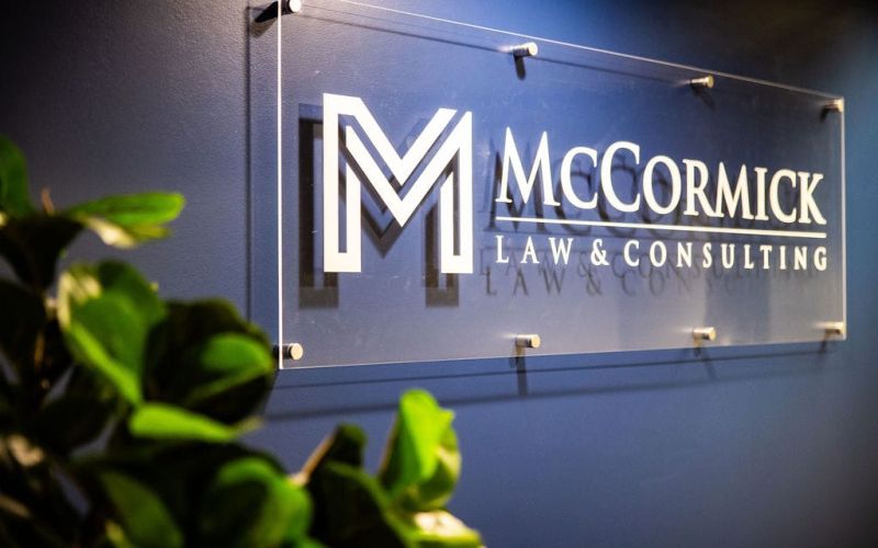 McCormick Law & Consulting logo sign